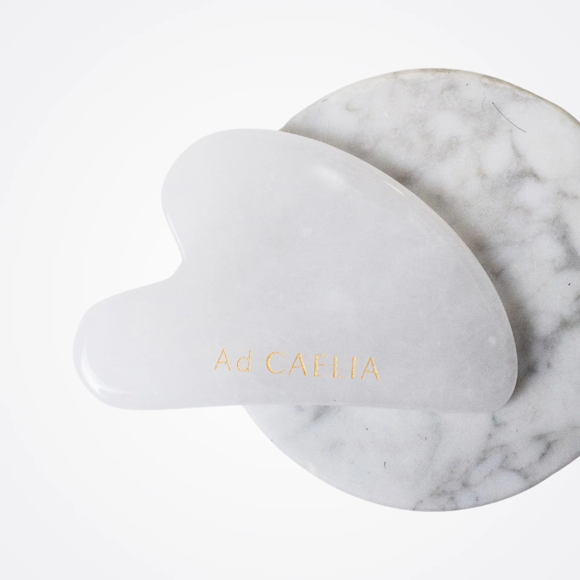 Gua sha en jade blanc pour le massage du visage Ad CAELIA